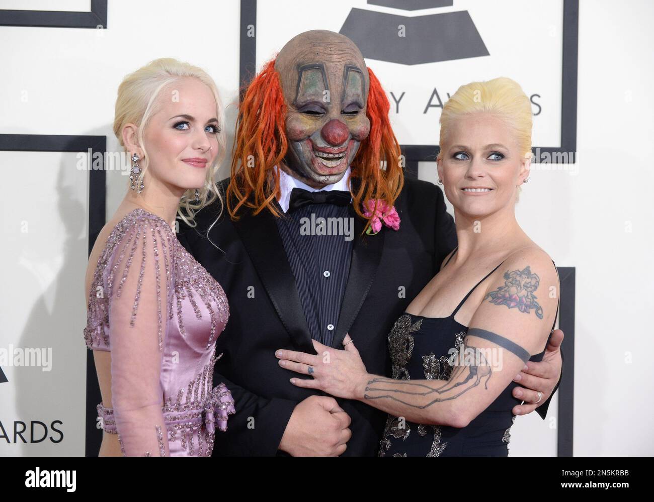 Slipknot member, center, and guests arrive at the 56th annual GRAMMY