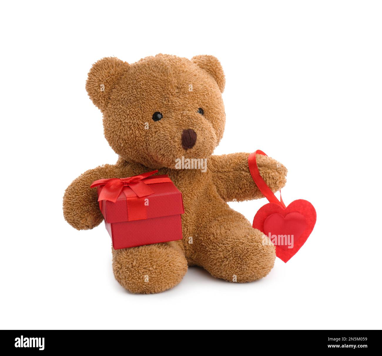 Cute teddy bear with red heart and gift box on white background ...