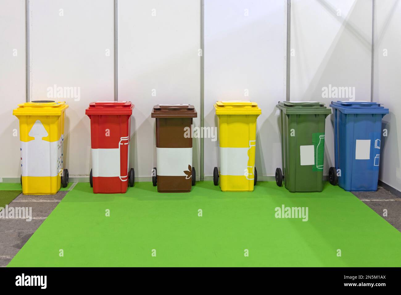 Colour coded sorting waste recycling trash wheelie bins stock photo alamy