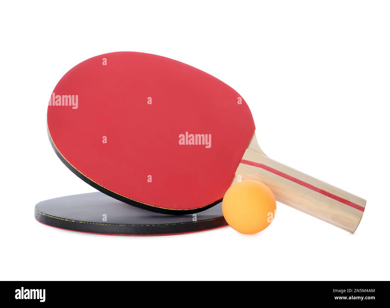 Orange plastic ball and rackets for table tennis on white background ...