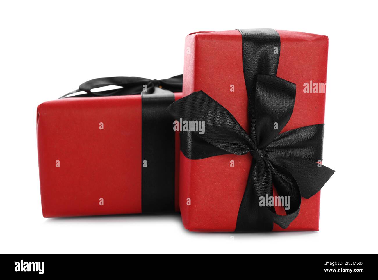 Red gift boxes with bows isolated on white Stock Photo - Alamy