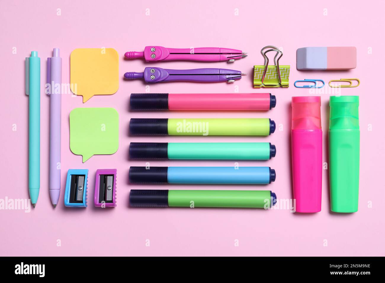Different school stationery on pink background, flat lay Stock Photo