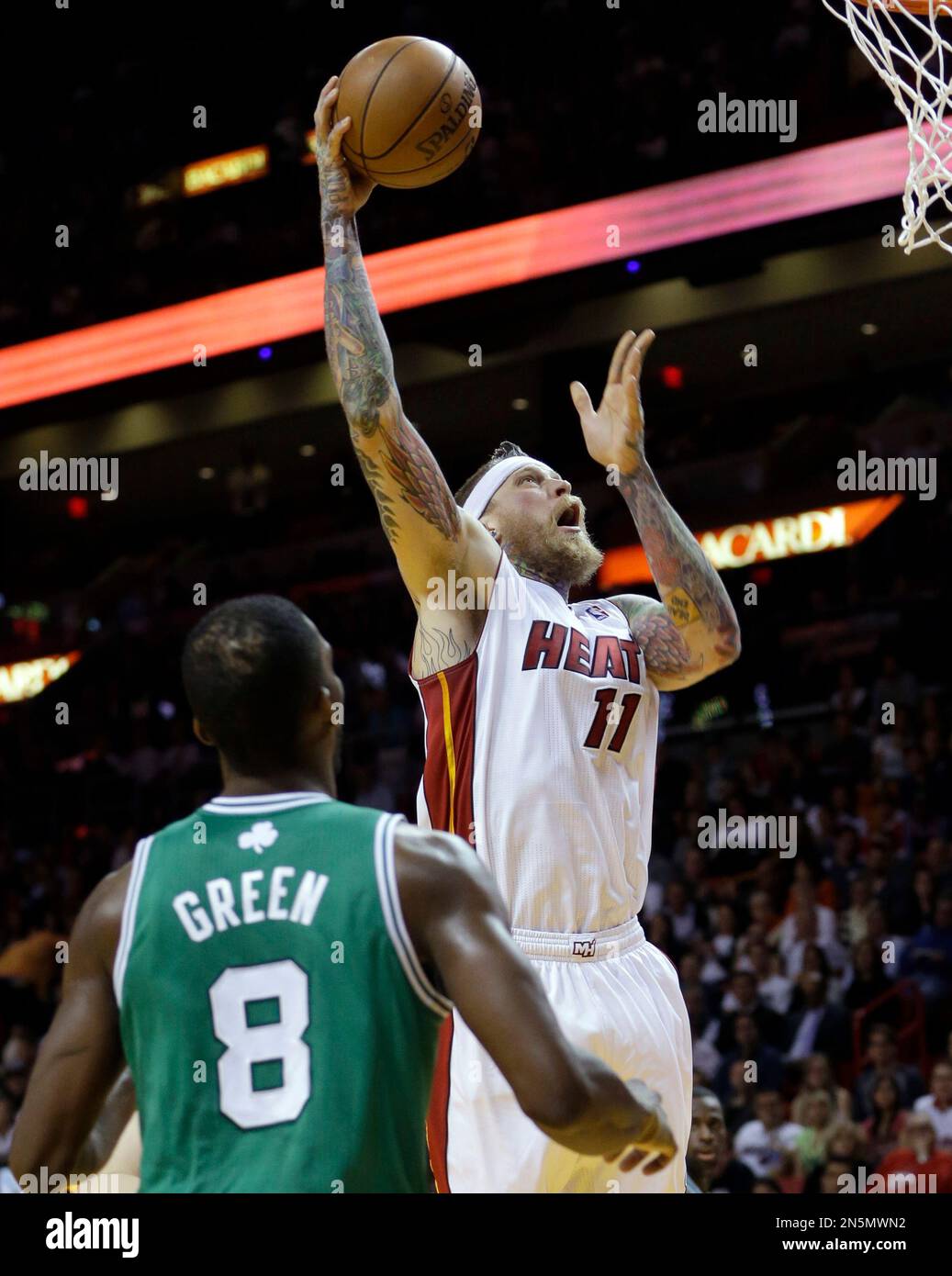 Miami Heat power forward Chris Andersen (11) goes to the basket against