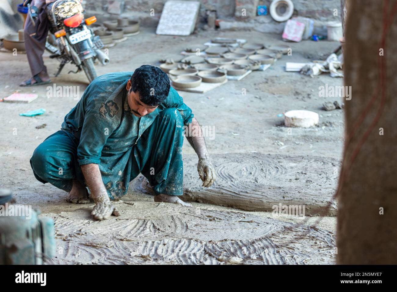 Hala Sindh Pakistan 2021, A man preparing clay for traditional pottery