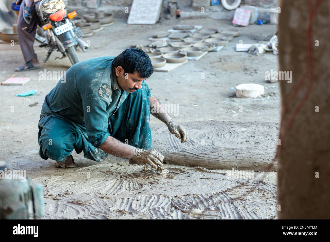 Hala Sindh Pakistan 2021, A man preparing clay for traditional pottery