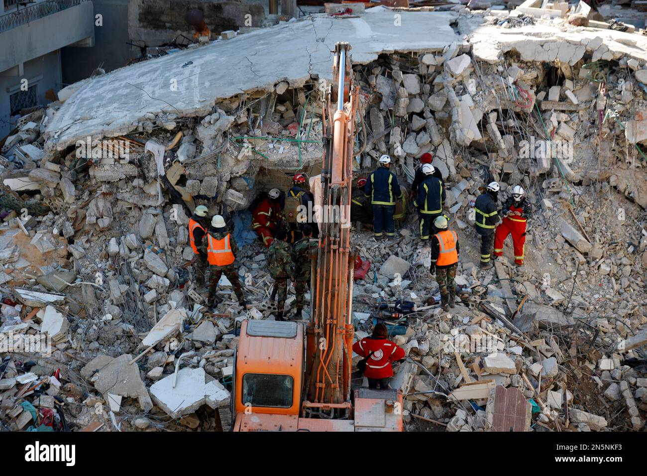 rescue-workers-search-for-survivor-on-a-collapsed-building-in-the