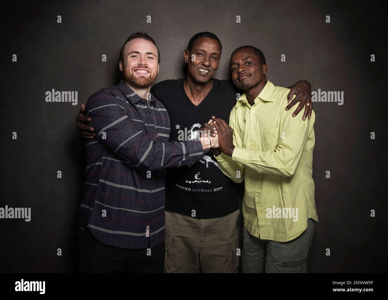 Cutter Hodierne, Abu Bakr Mirre and Abdikani Muktar pose for a portrait