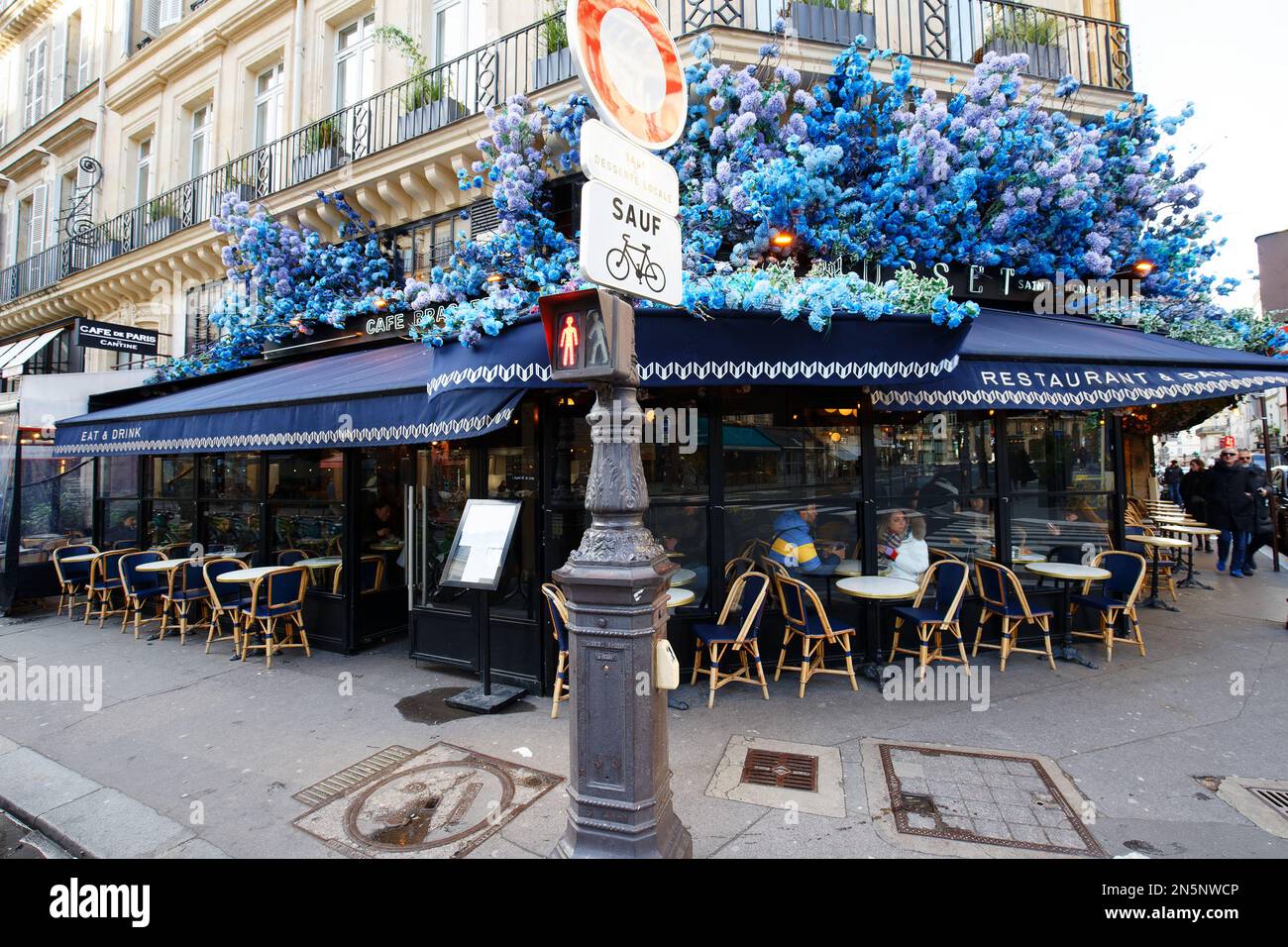 Exterior of Le Musset restaurant decorated with beautiful blue hydrangea flowers Stock Photo