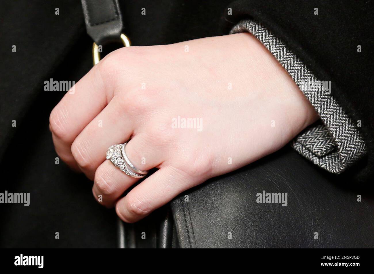 Rings are seen on the finger of cast member Christina Hendricks as she poses at the premiere of the film God s Pocket during the 2014 Sundance Film Festival on Friday Jan. 17