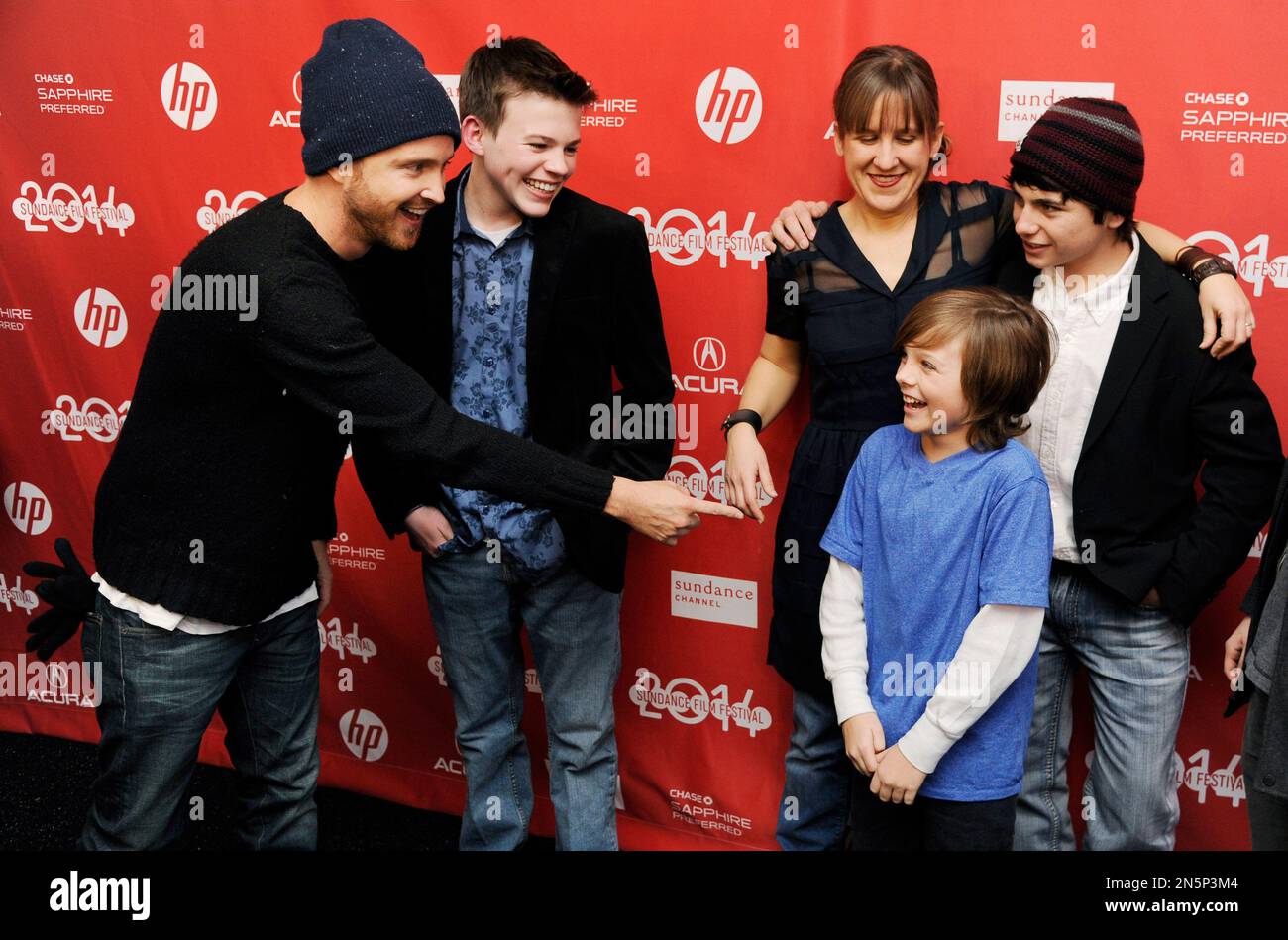 Aaron Paul, left, a cast member in "Hellion," points to fellow cast