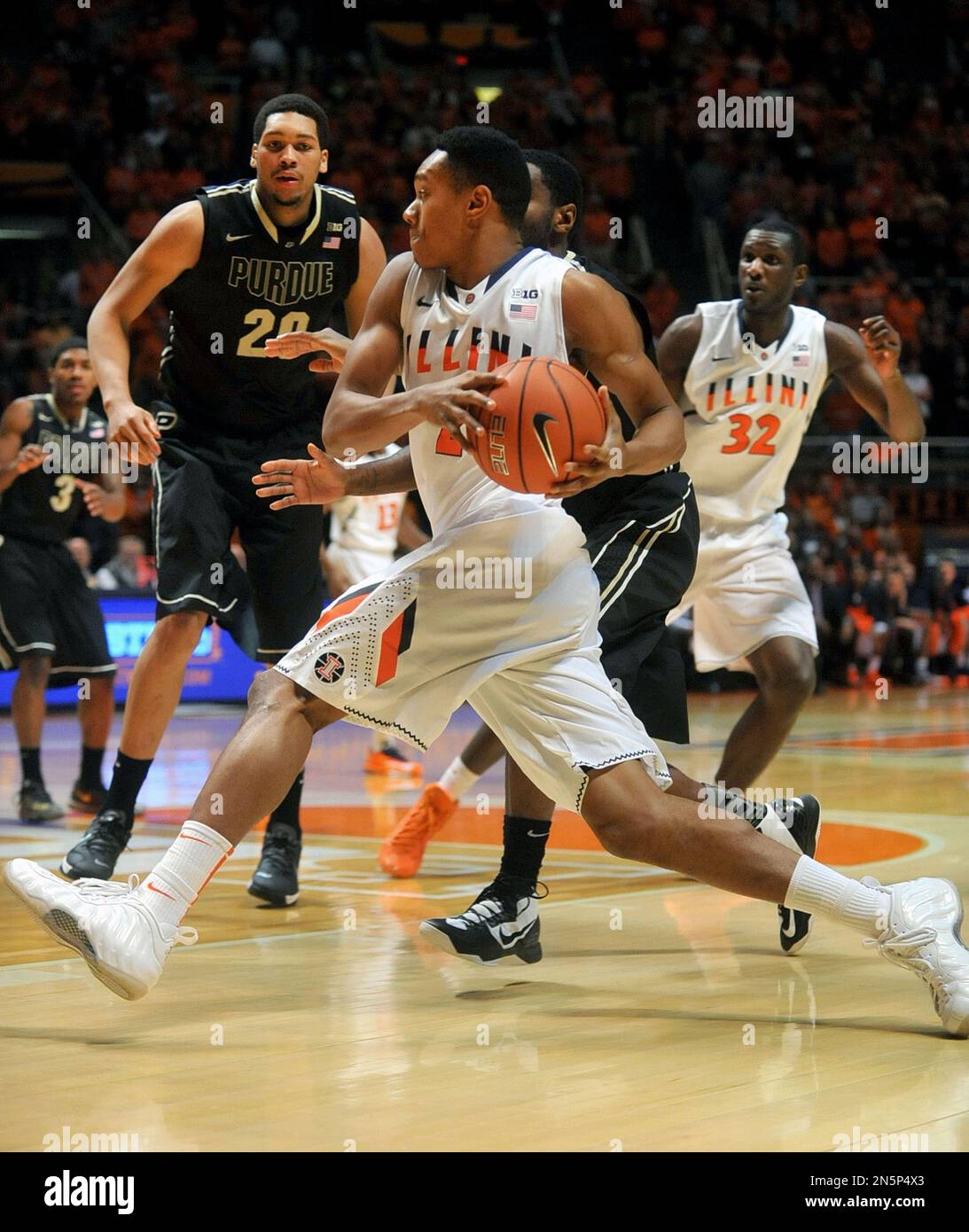 Illinois Fighting Illini guard Joseph Bertrand (2) drives in the first half of an NCAA college
