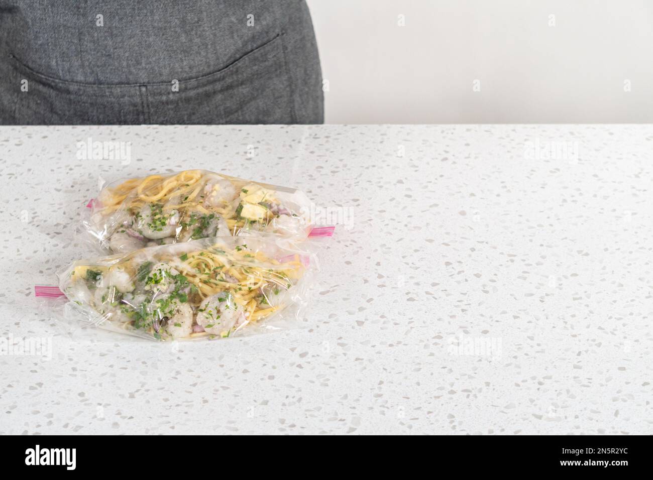 Frozen shrimp scampi meal prep Stock Photo - Alamy