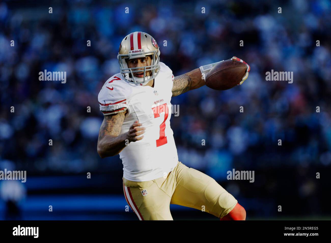 San Francisco 49ers quarterback Colin Kaepernick (7) walks off the field  after the second half of a divisional playoff NFL football game against the  Carolina Panthers, Sunday, Jan. 12, 2014, in Charlotte