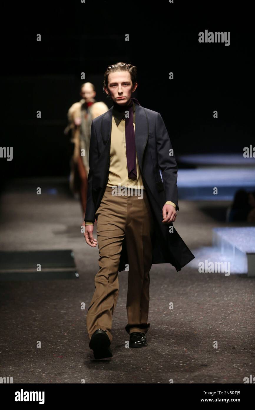 A model wears a creation for Prada men's Fall-Winter 2014 collection, part of the Milan Fashion Week, unveiled in Milan, Italy, Sunday, Jan.12, 2014. (AP Photo/Luca Bruno Stock Photo - Alamy A model wears a creation for Prada men's Fall-Winter 2014 collection, part of the Milan Fashion Week, unveiled in Milan, Italy, Sunday, Jan.12, 2014. (AP Photo/Luca Bruno Stock Photo - Alamy
