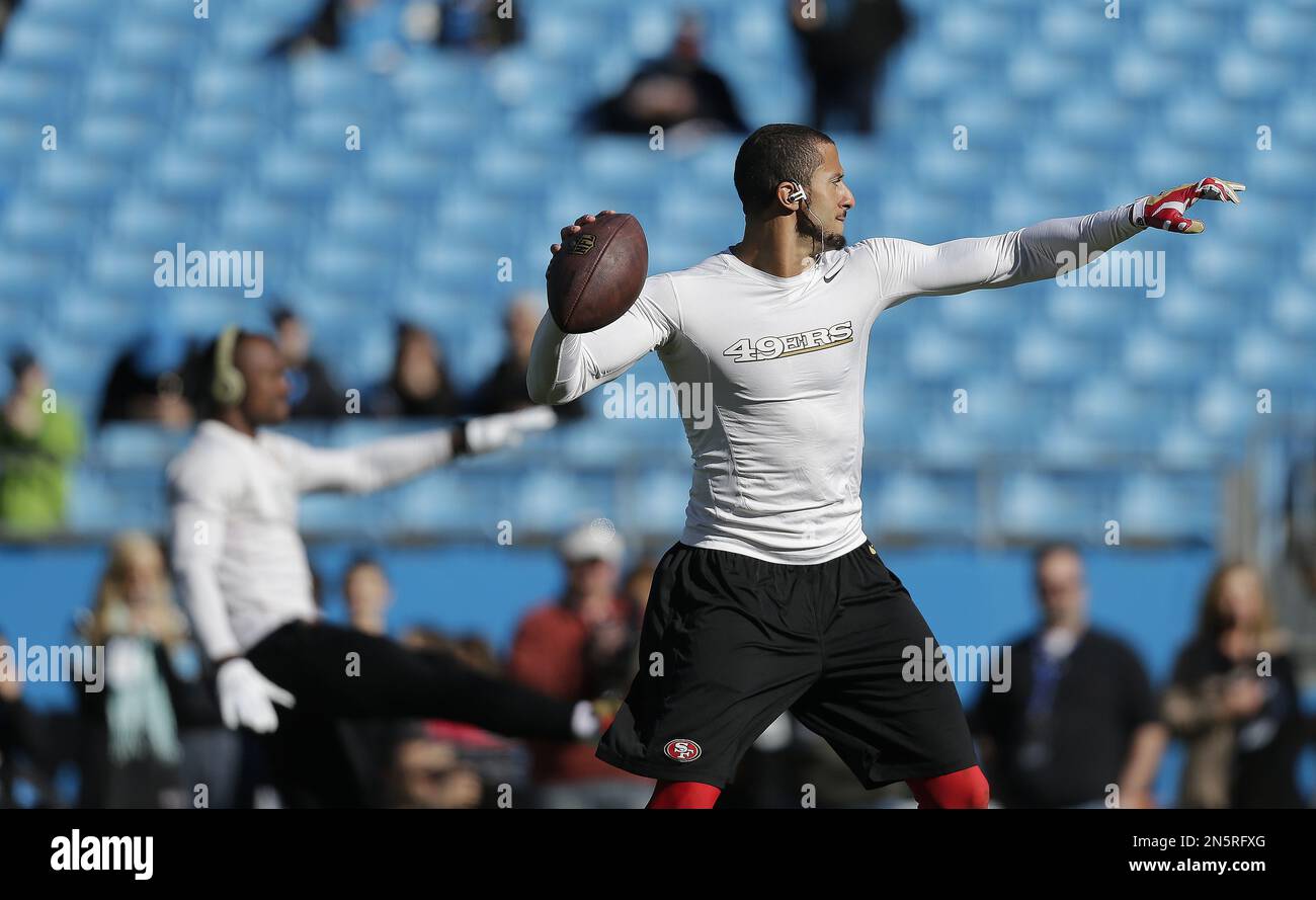 San Francisco 49ers quarterback Colin Kaepernick (7) walks off the field  after the second half of a divisional playoff NFL football game against the  Carolina Panthers, Sunday, Jan. 12, 2014, in Charlotte