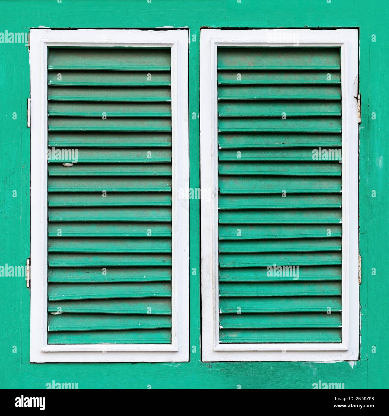 Green colonial style wooden window, Guayaquil, Ecuador. Stock Photo