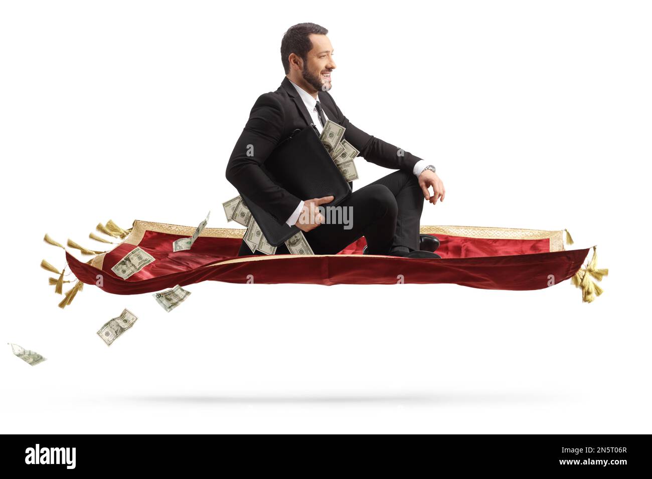 Businessman holding a briefcase with money and sitting on a flying