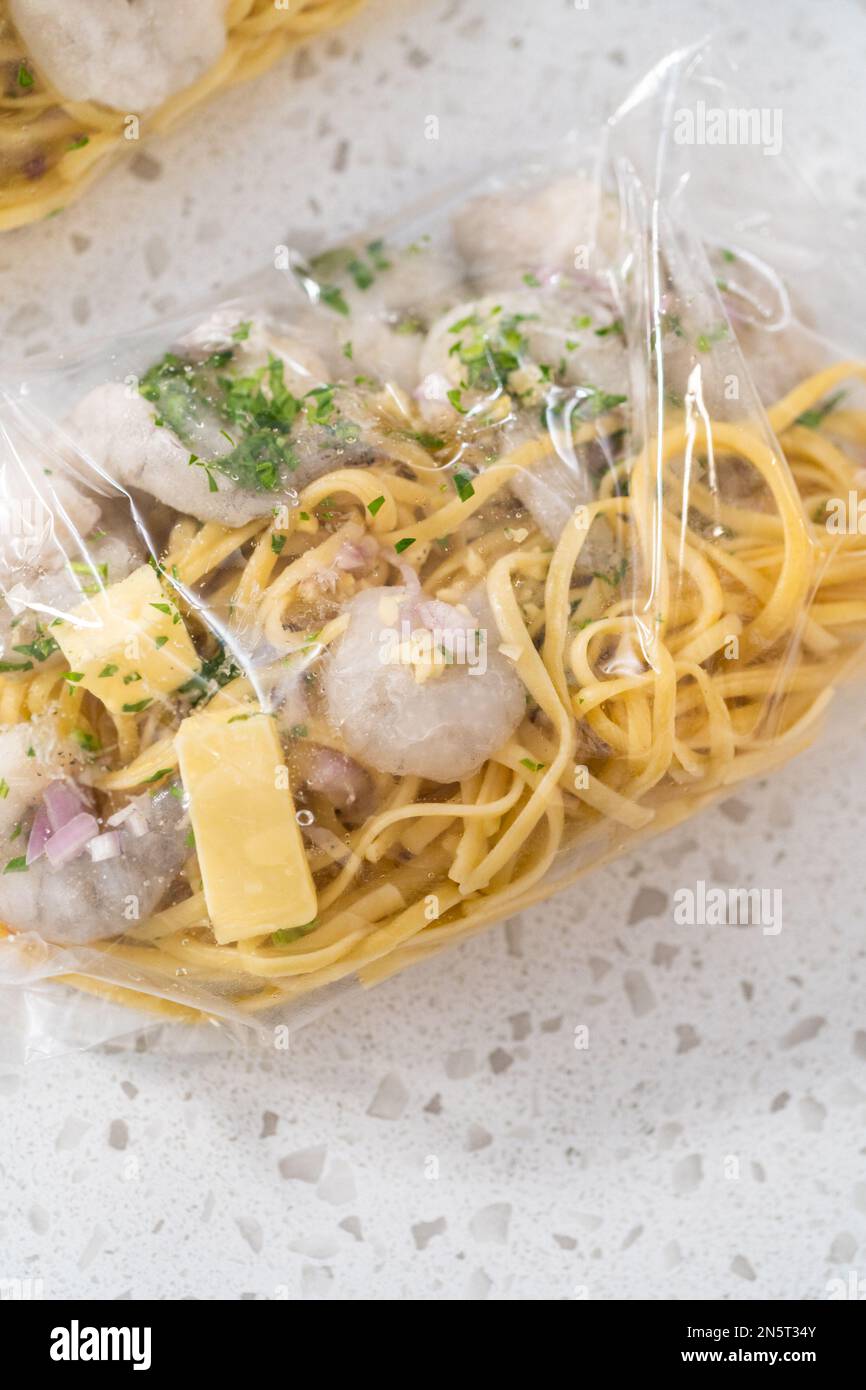 Frozen shrimp scampi meal prep Stock Photo - Alamy