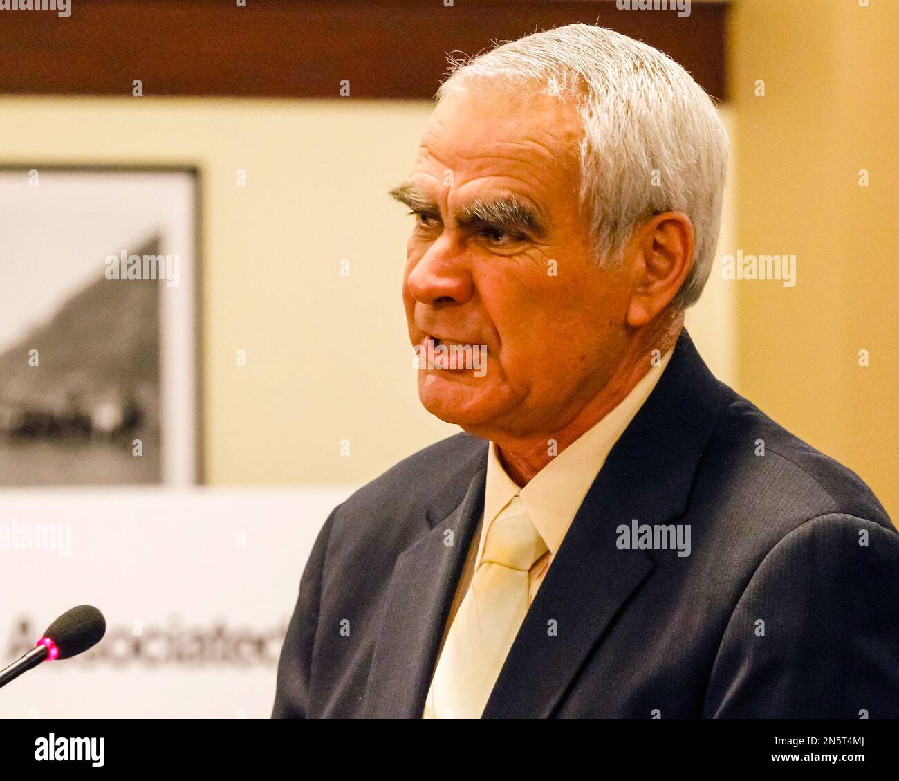 Richard "Rich" Wills, R-Glenns Ferry, talks with reporters about