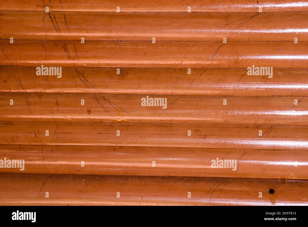 Close up wood texture detail of abstract yellowbrown bamboo stick