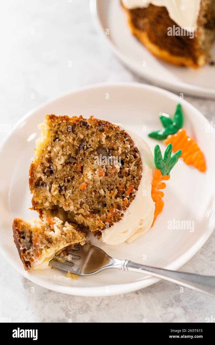 Carrot bundt cake with cream cheese frosting Stock Photo Alamy