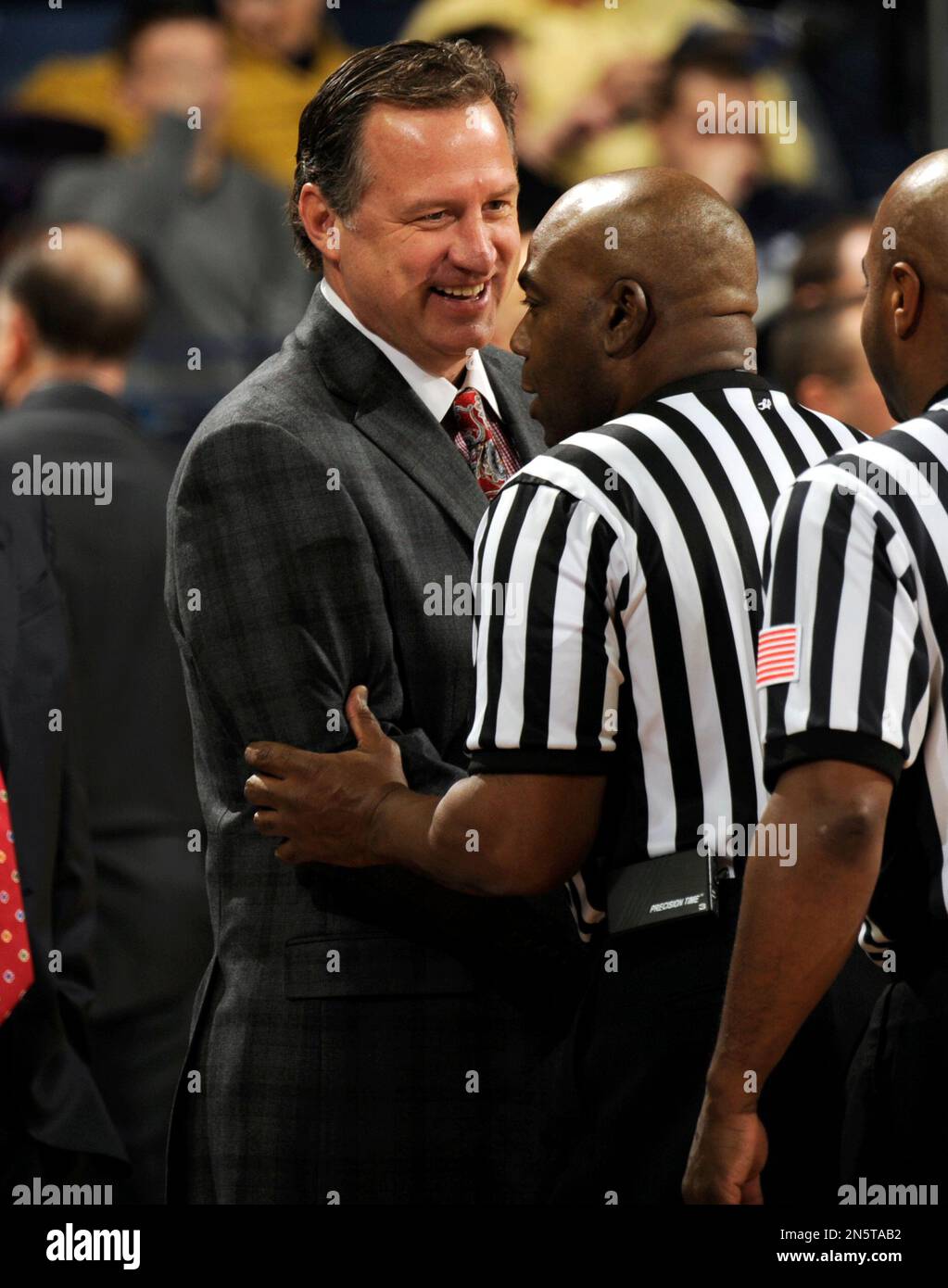 North Carolina State coach Mark Gottfried shakes hands with the