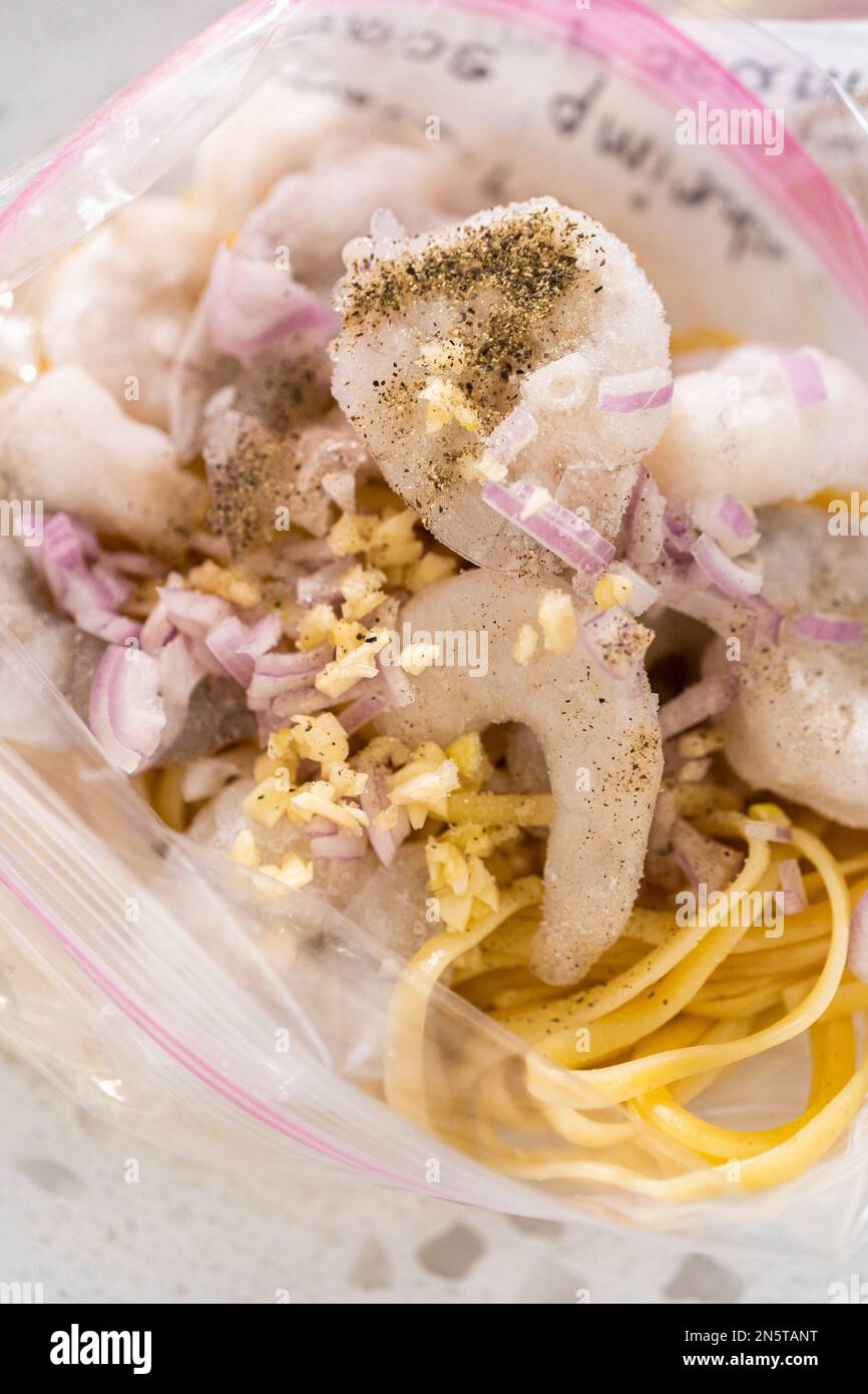 Frozen shrimp scampi meal prep Stock Photo - Alamy