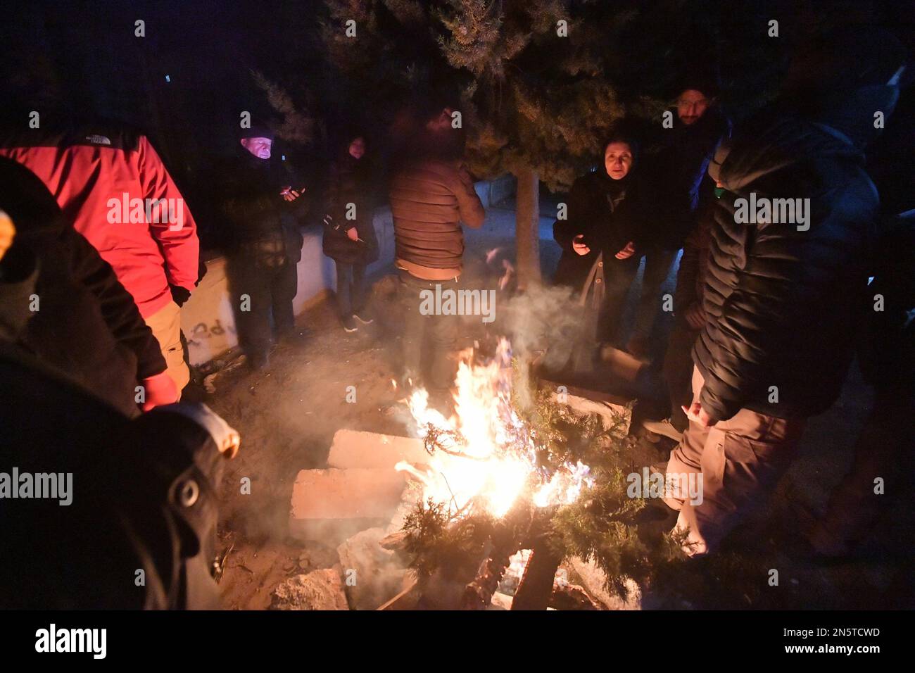 Turkey. Province Kakhramanmarash. People are heated at a fire near ...