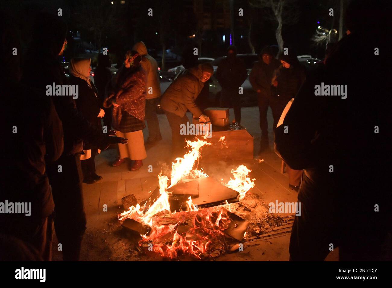 Turkey. Province Kakhramanmarash. People are heated at a fire near ...