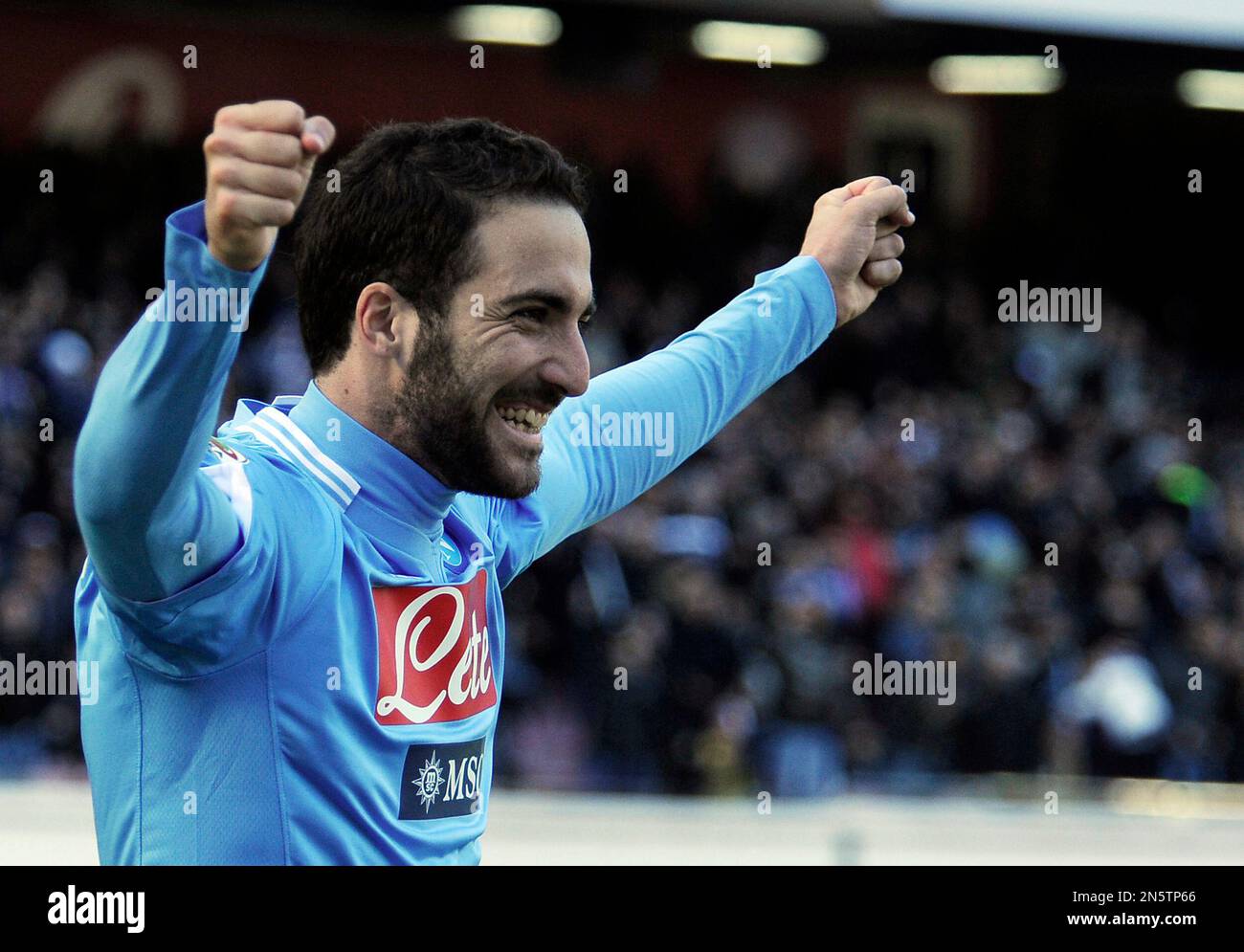 Napoli's Gonzalo Higuain, celebrates after his teammate Dries Mertens ...