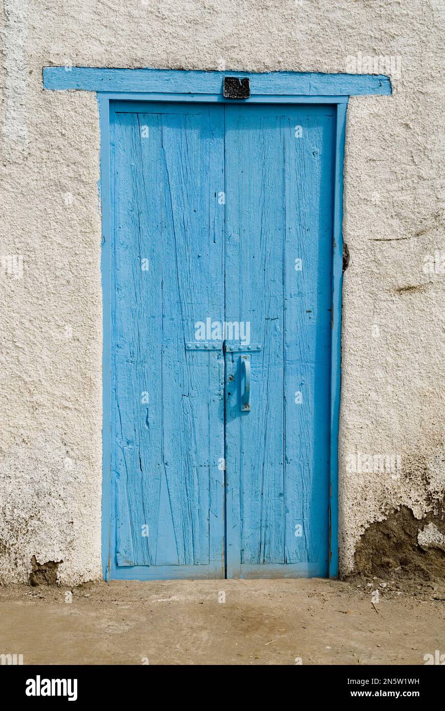 Old door of a farm or rural house painted blue Stock Photo - Alamy