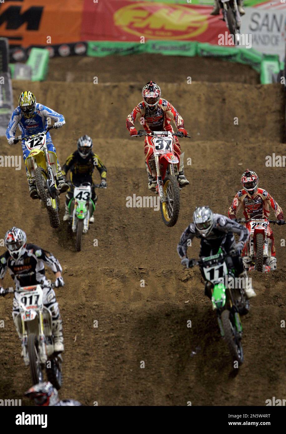 In this April 19, 2008, photo, riders make their way around the track during an AMA Supercross motorcycle race in St
