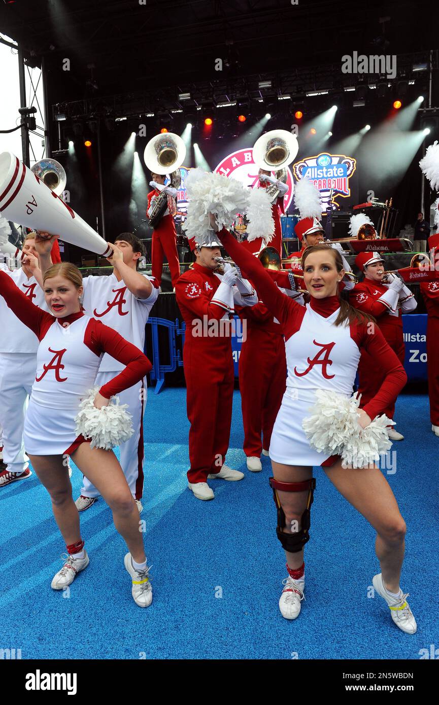 University of Alabama cheerleaders and marching band rouse football