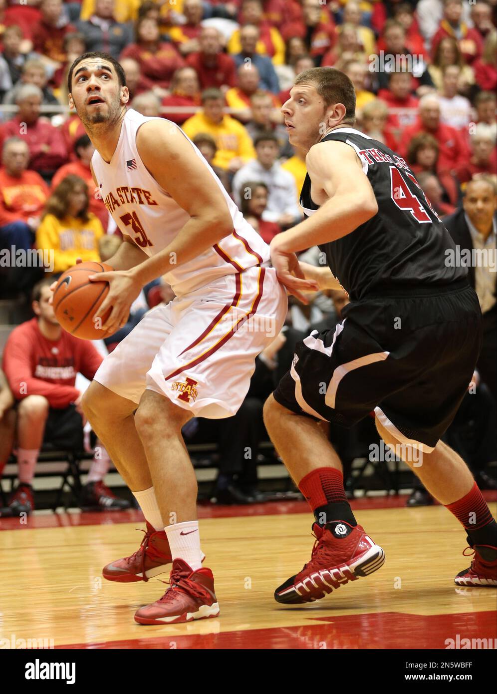 Iowa State forward Niang (31) goes around Northern Illinois