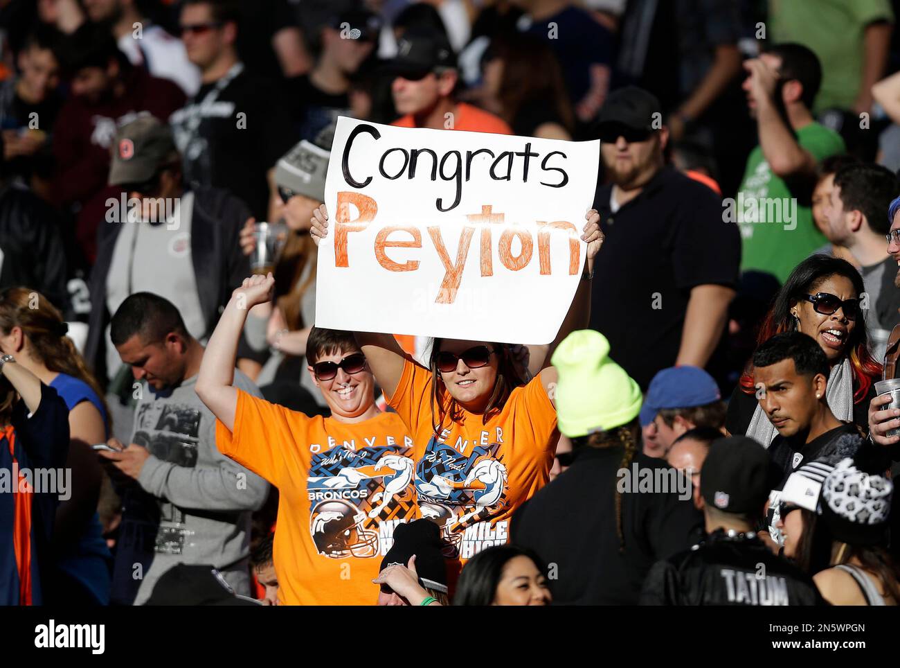 denver-broncos-fans-hold-up-a-sign-for-quarterback-peyton-manning-after