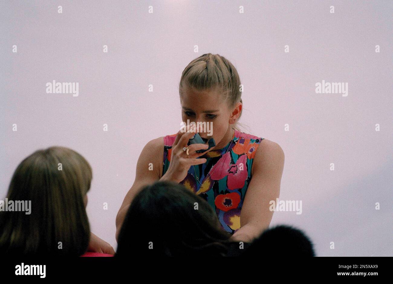 American figure skater Tonya Harding takes a break to use her inhaler