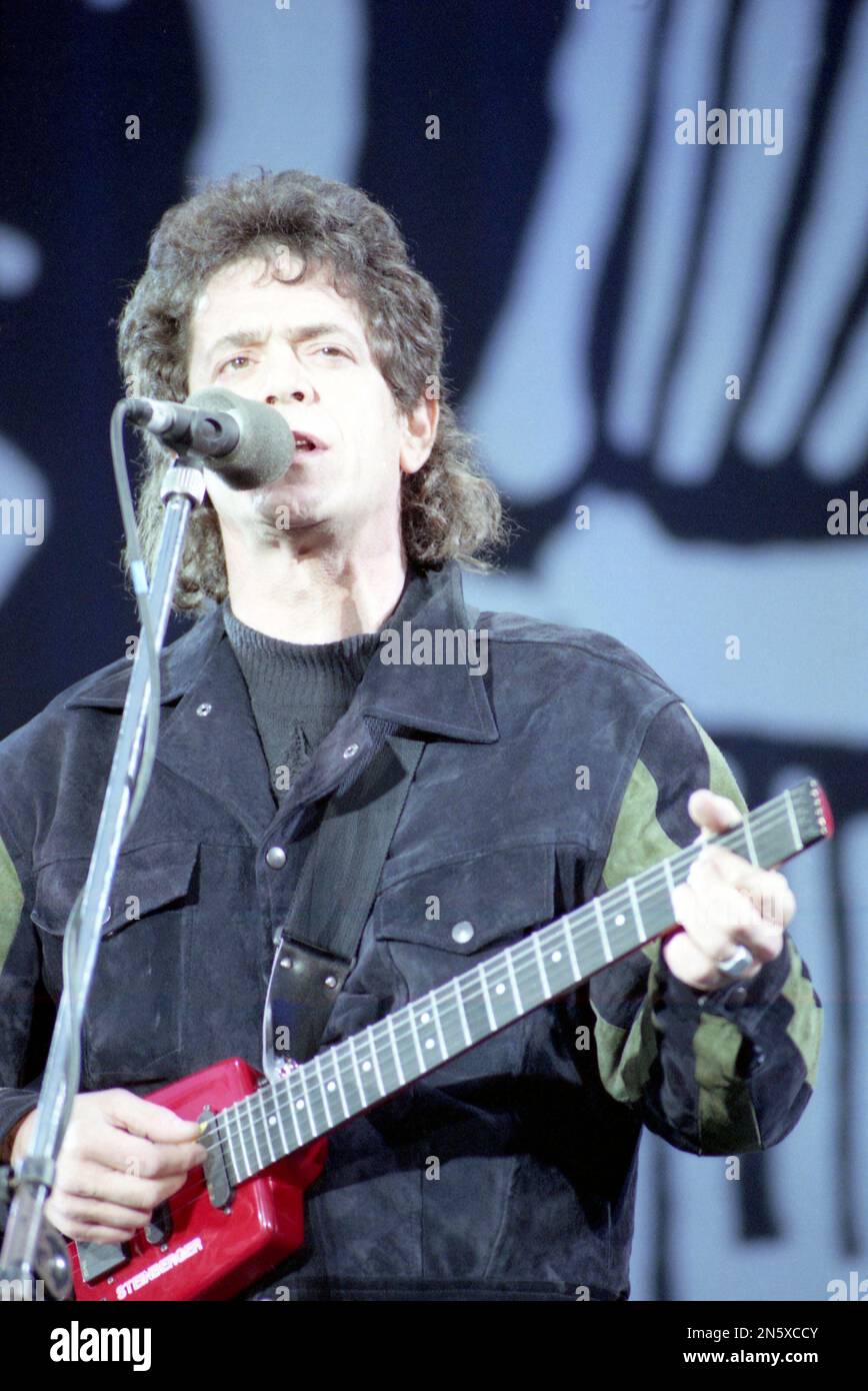 Lou Reed 1996 American musician Lou Reed performs at the Mandela concert at London's ...