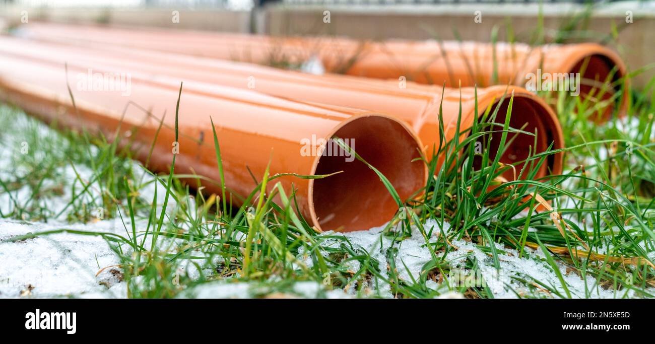 red plastic pipe for waste water in the construction site Stock Photo Alamy
