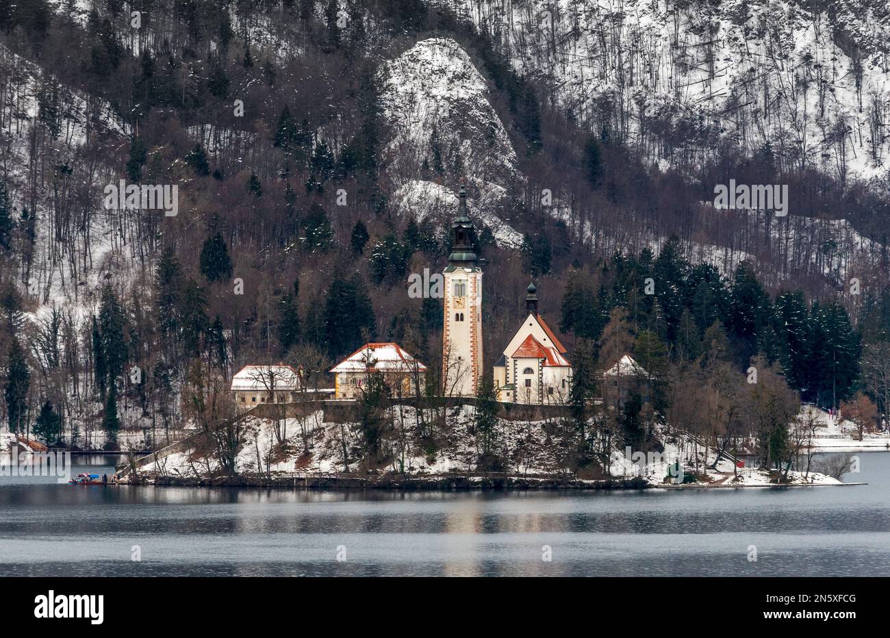 Bled, Slovenia - January 20th 2023: The Sanctuary of the Assumption of the Virgin Mary in Slovenia in a winter night. Stock Photo