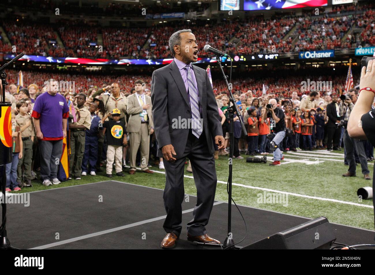 Singer John Boutte performing the National Anthem during pregame