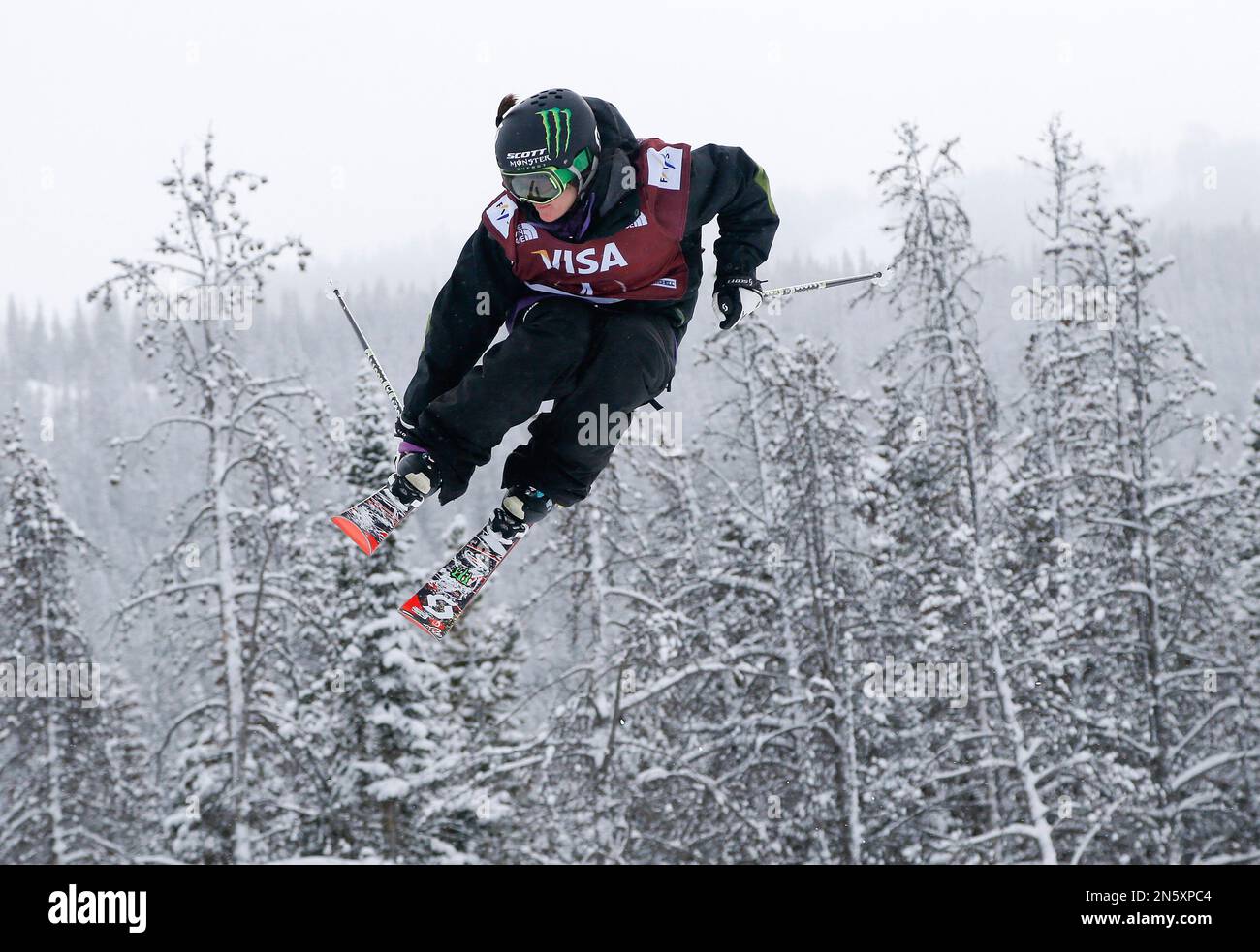 Keri Herman grabs a ski off a jump during the World Cup U.S. Grand Prix slopestyle freestyle