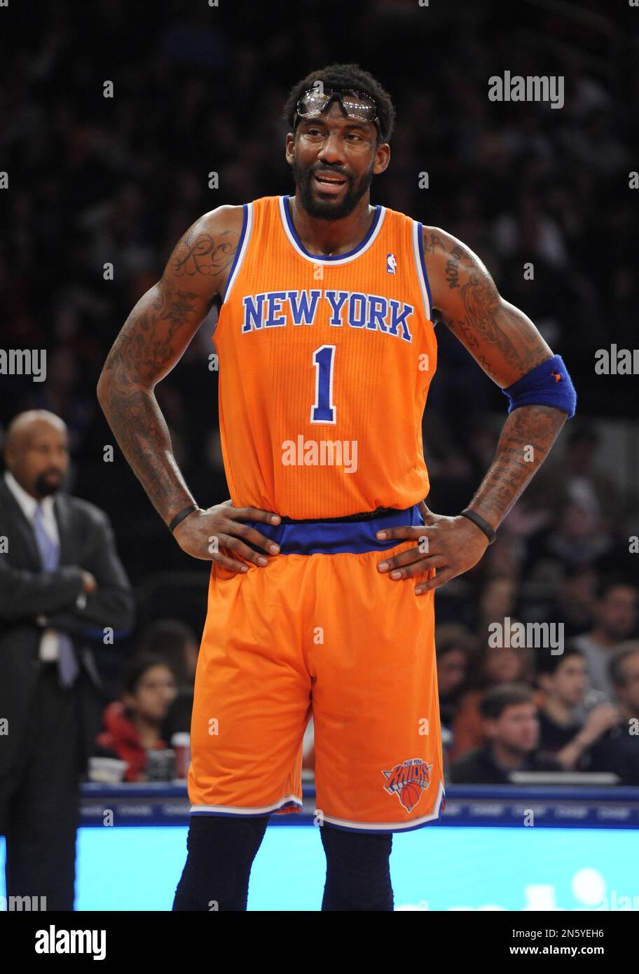New York Knicks power forward Amar'e Stoudemire (1) smiles during a time  out in an NBA basketball game against the Boston Celtics on Sunday, Dec. 8,  2013, in New York. (AP Photo/Kathy, image size:912x1390