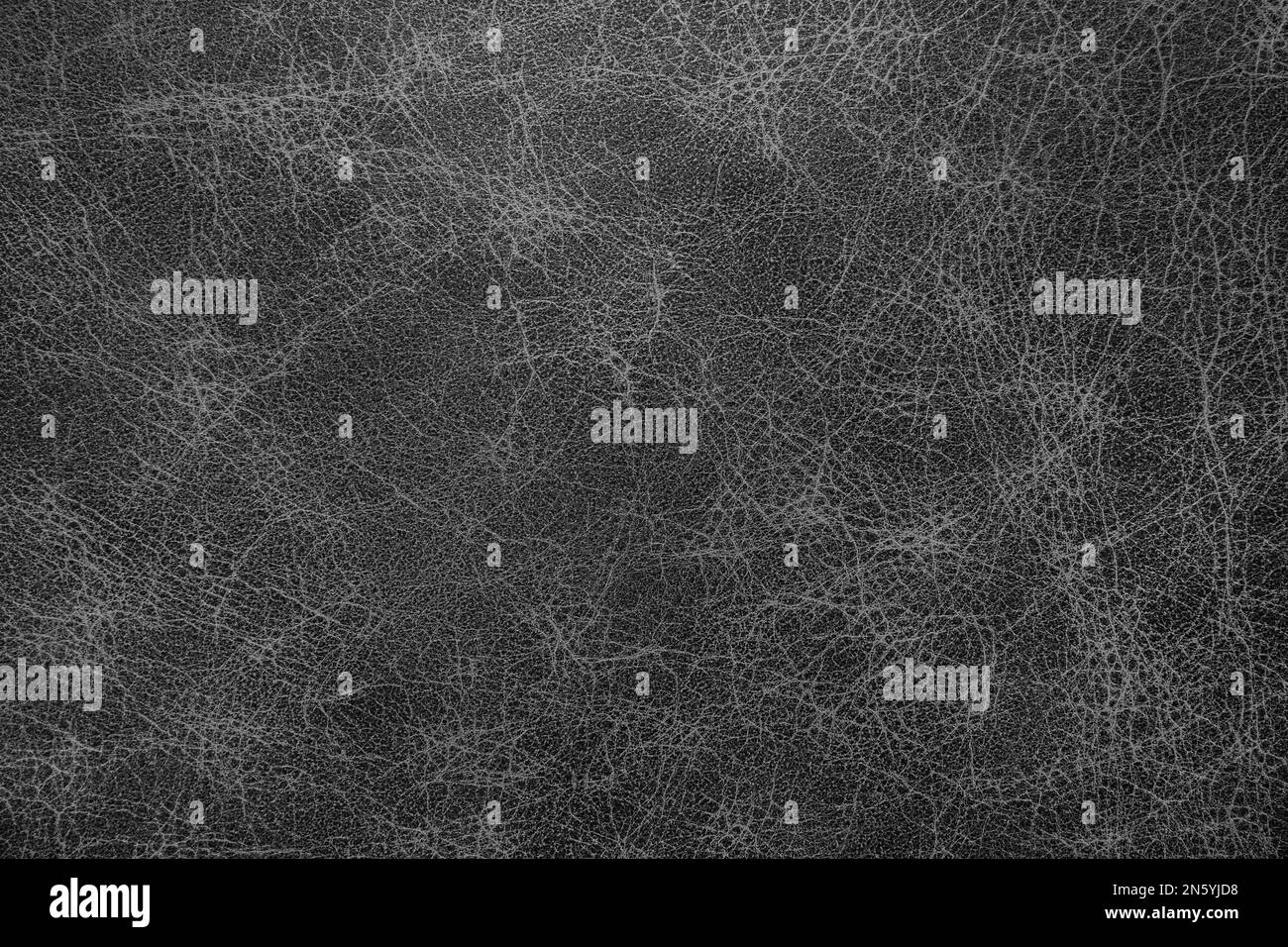 Genuine, natural, artificial black leather texture background. Luxury material for header, banner, backdrop, wallpaper, clothes, furniture and interio Stock Photo