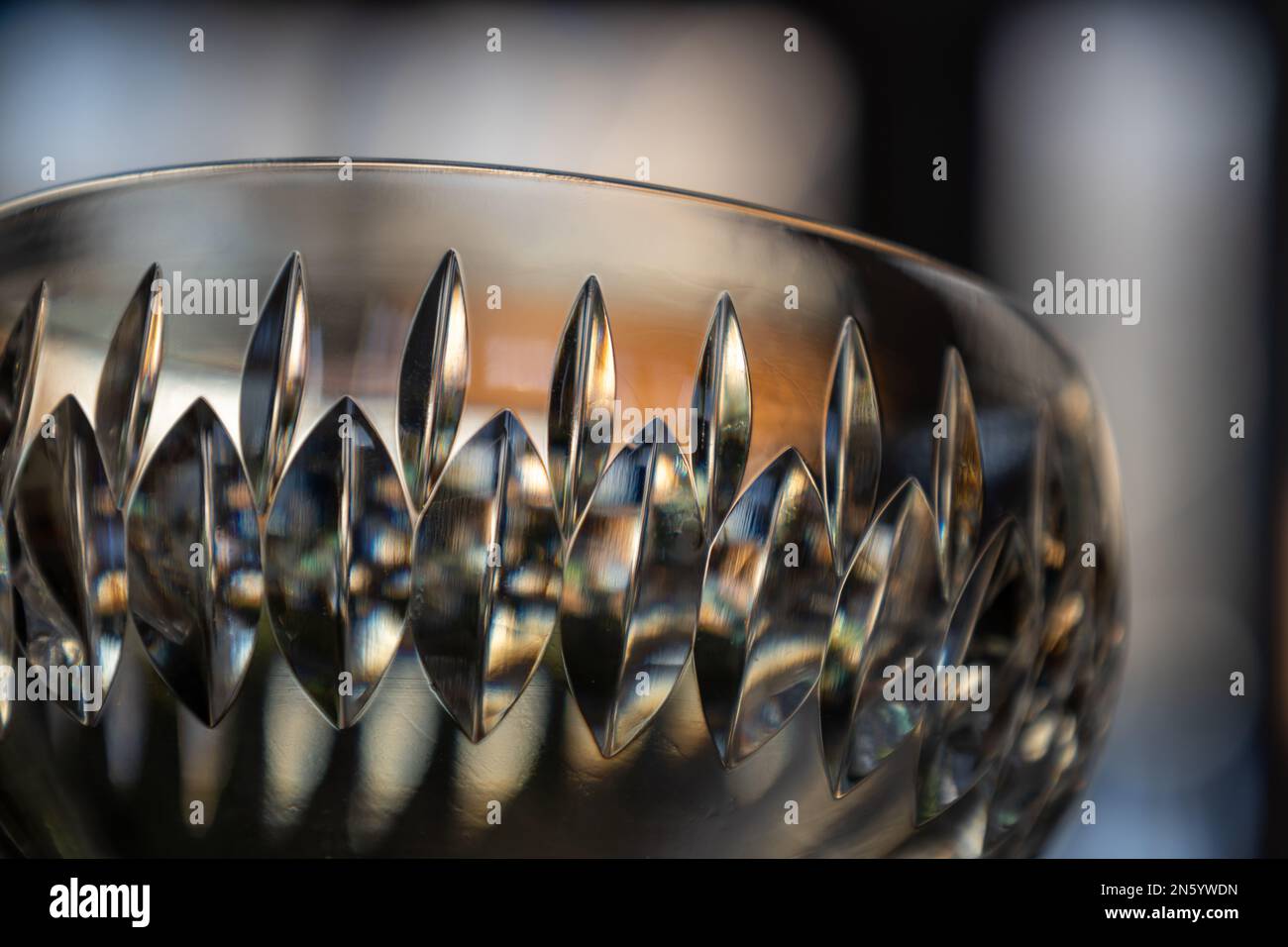 Macro abstract view of a beautiful hand-cut modern lead crystal bowl, with defocused background Stock Photo