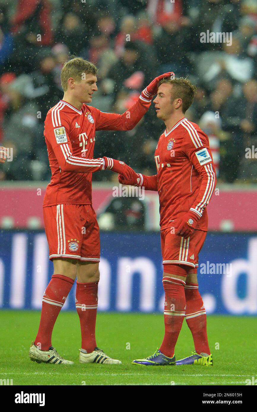 Munich's Mario Goetze, right, and Munich's Toni Kroos celebrate