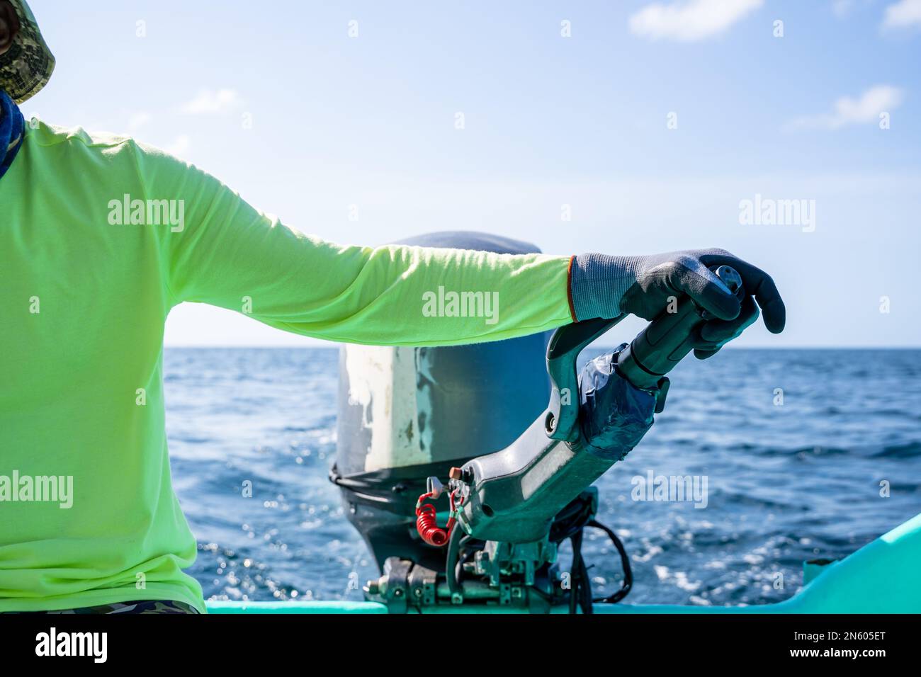 Captain driving motorboat hi-res stock photography and images - Alamy