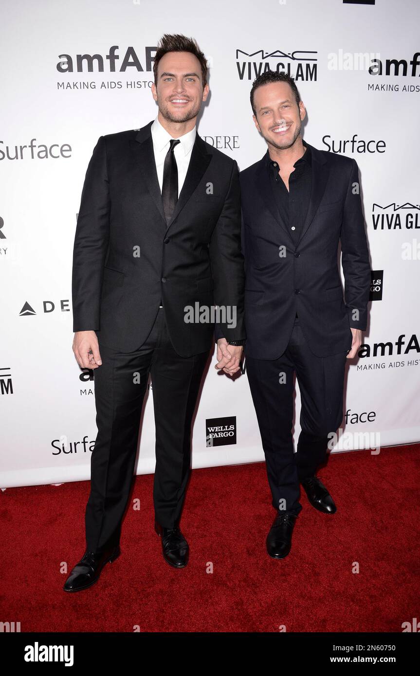 Actor Cheyenne Jackson, left, and Monte Lapka arrive at the fourth