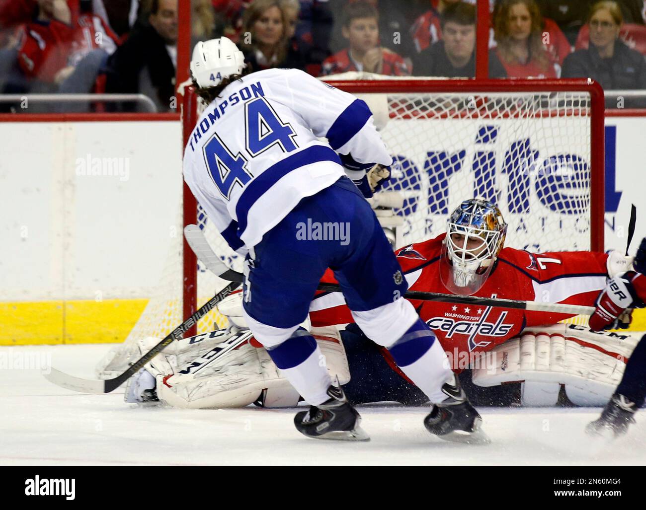 Tampa Bay Lightning center Nate Thompson (44) scores over Washington