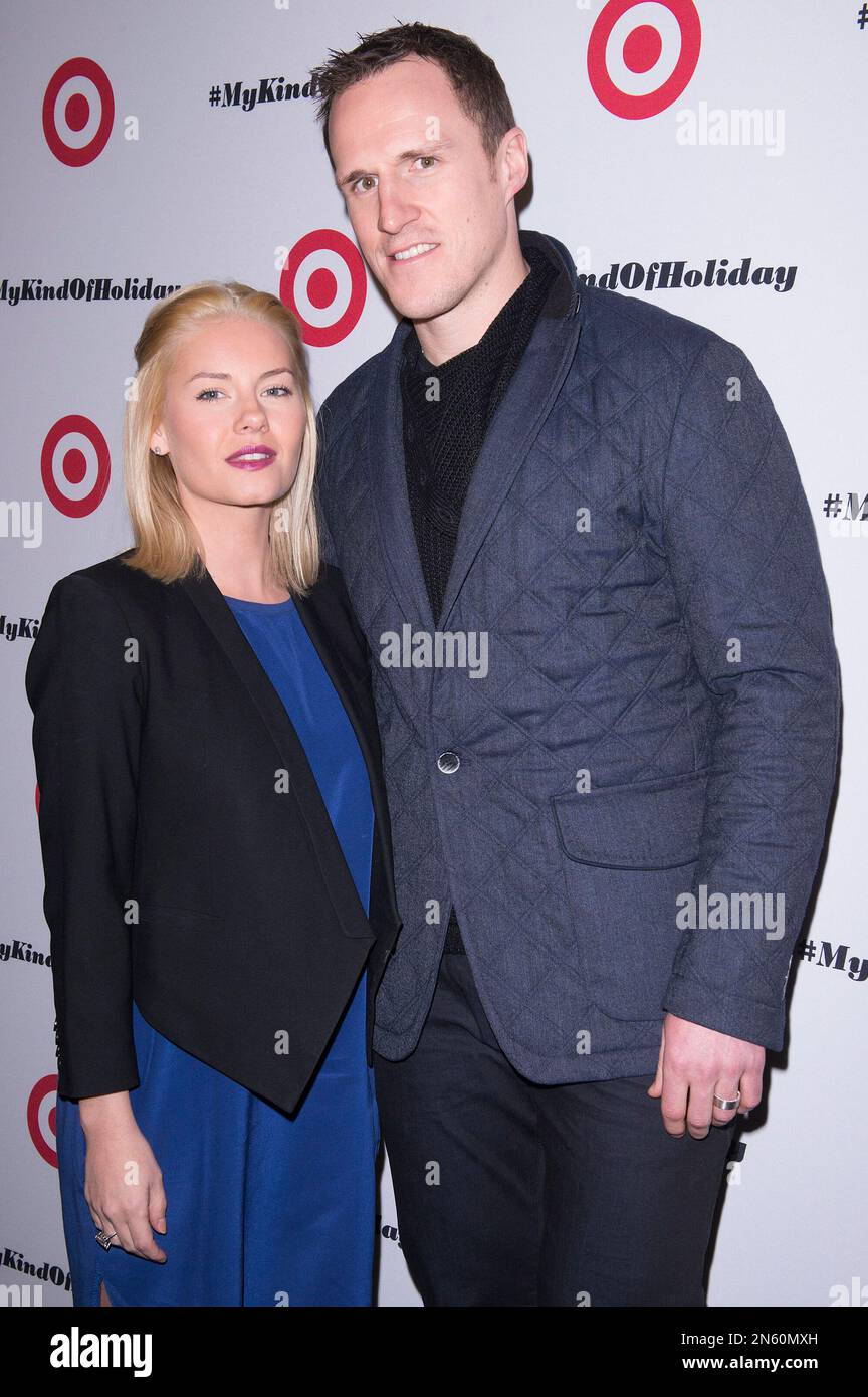 Elisha Cuthbert and her husband and professional hockey player Dion