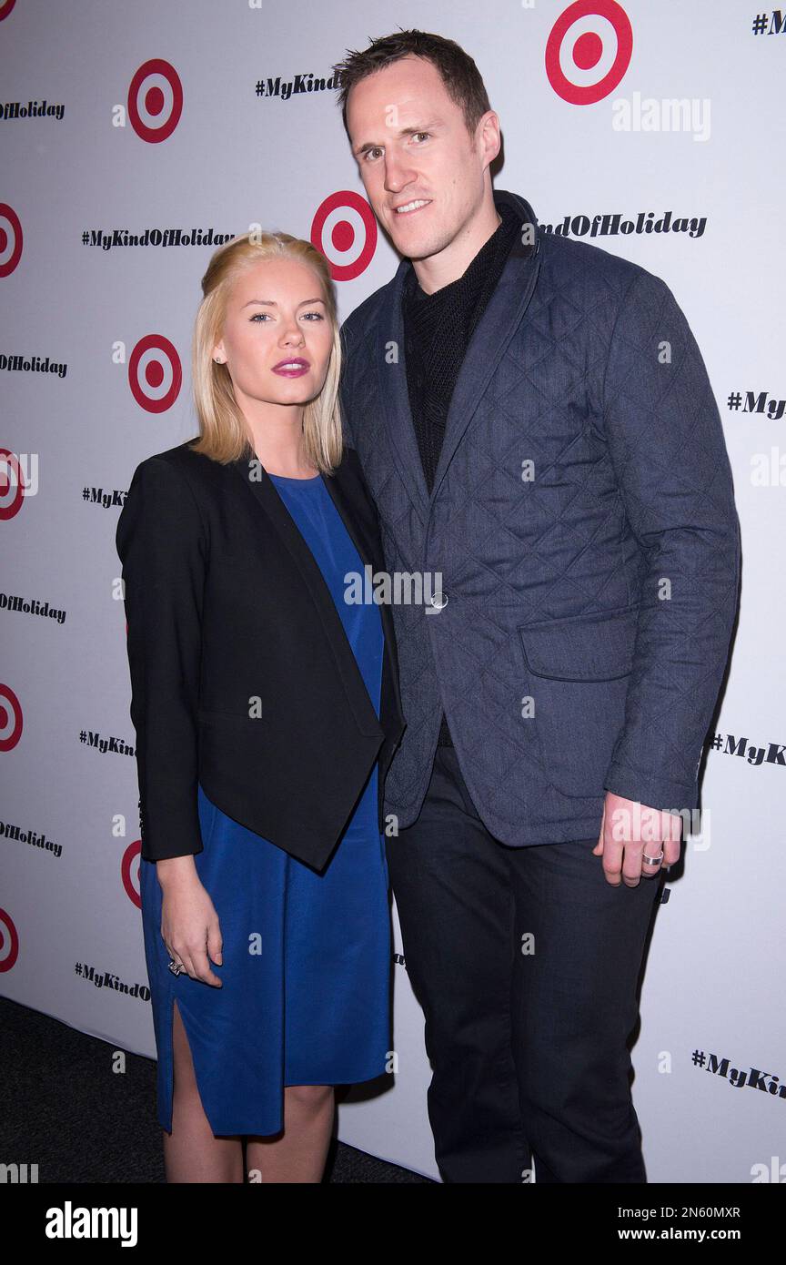 Elisha Cuthbert and her husband and professional hockey player Dion